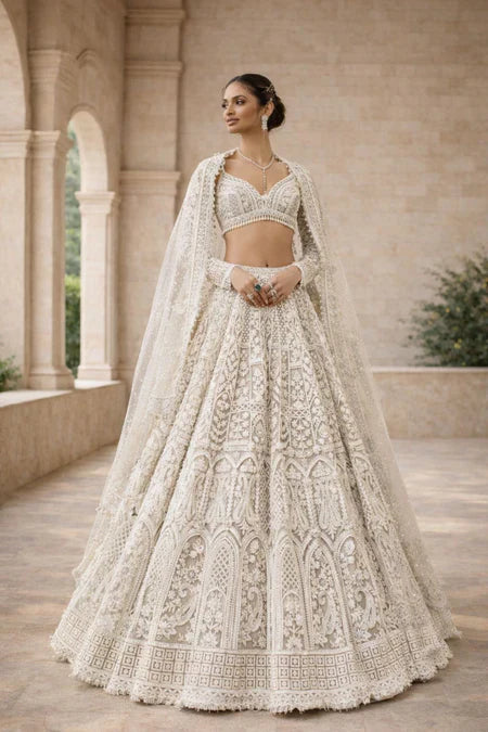 Ivory Pearl White Heavy Embroidered Bridal Lehenga Set in USA – Available at Swaraksha Fashions, Overland Park KS