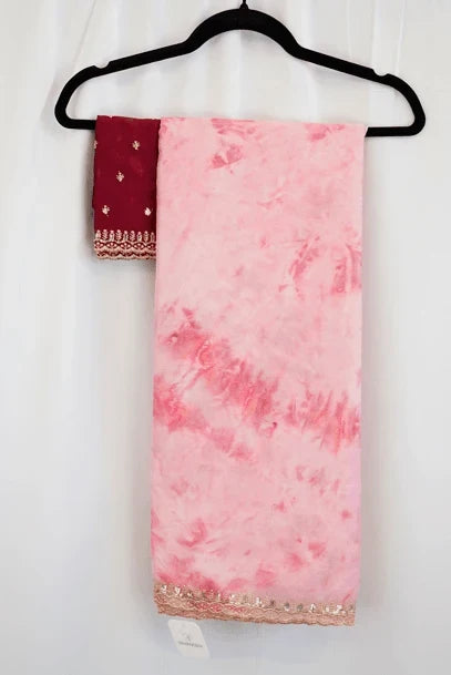 Baby Pink Marble Print Saree with Gold Sequin Border and Maroon Embroidered Blouse