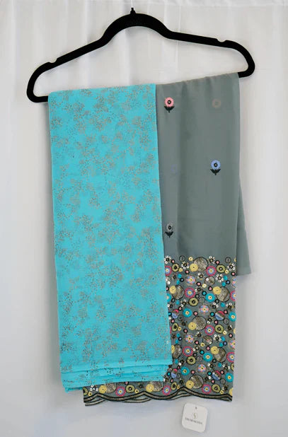 Aqua Blue Saree with Golden Floral Work and Steel Grey Embroidered Blouse – Sophisticated Festive Glamour in the USA