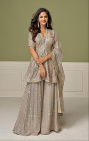 Gulkayra A Champagne Gold Embroidered Peplum Kurti Sharara