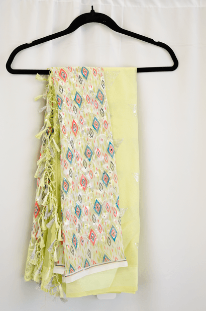 Light Lime Green Saree with Multicolor Geometric Embroidery and Tassel Border