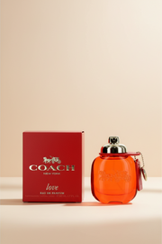 Coach New York perfume bottle and packaging on a white background