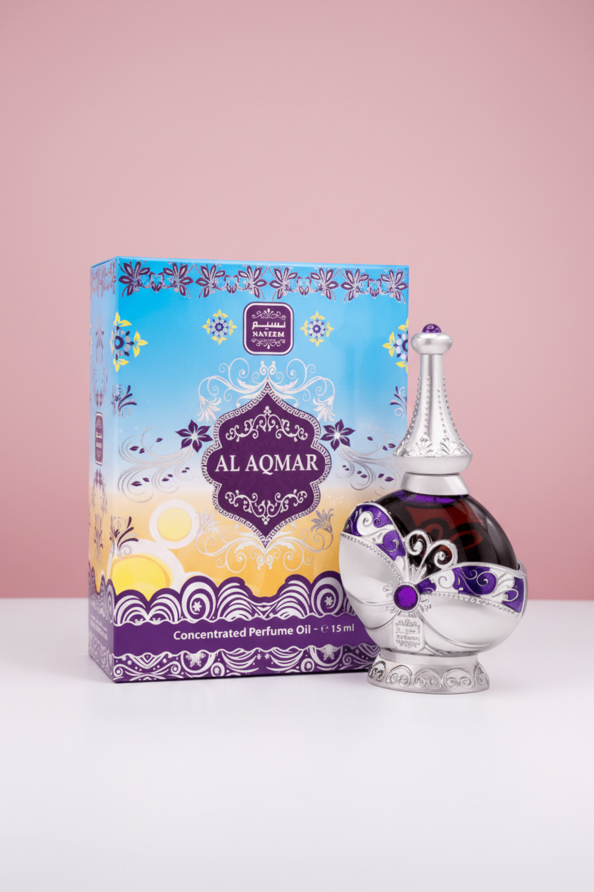 Al Aqmar perfume bottle and packaging with decorative design