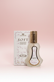 Perfume bottle and packaging with 'Crown Perfumes' branding on a white background