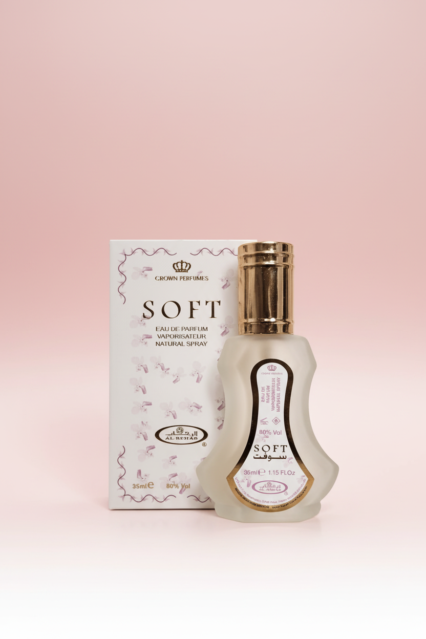 Perfume bottle and packaging with 'Crown Perfumes' branding on a white background