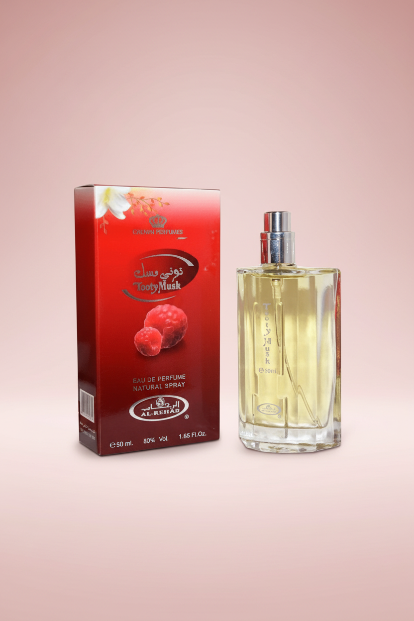 Perfume bottle and packaging with a red box featuring branding on a white background