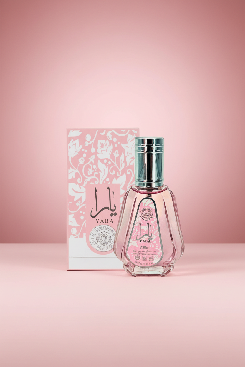 Pink Yara perfume bottle with matching box on a white background