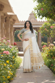 Pastel Green Silk Saree With Golden Zari Border & Blouse Piece