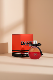 Perfume bottle with a black bow and packaging labeled 'Dark' by Estiara on a white background.