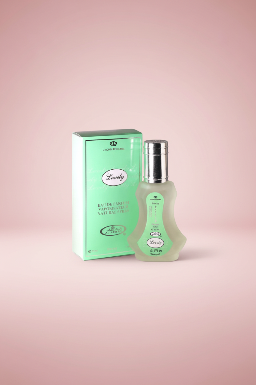 Perfume bottle and packaging with 'Crown Perfumes' branding on a white background