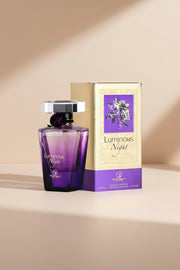 Perfume bottle and packaging of Luminous Night on a white background