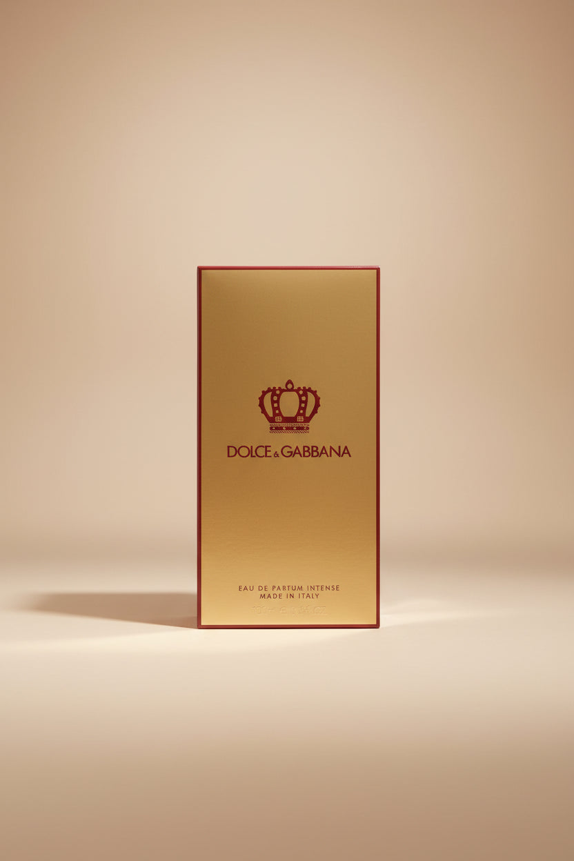 Dolce & Gabbana perfume box with crown logo on beige background